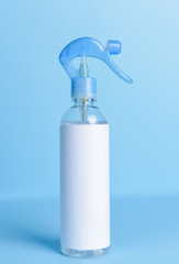 Bottle of air freshener on color background