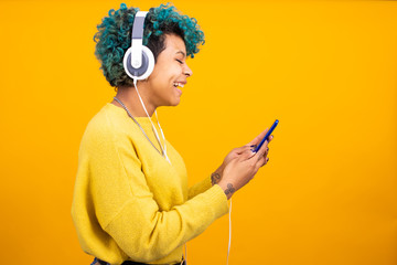 isolated girl with mobile phone and headphones