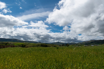 Obraz premium spring surrounded by beautiful clouds