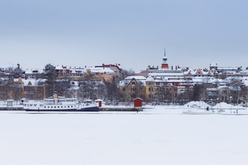 View of the center of Östersund from the frozen Lake Storsjön