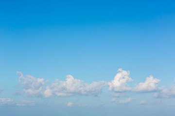 Blue sky background with tiny clouds. Sky is a beautiful patterned cloud in the daytime during the summer is a panoramic image.