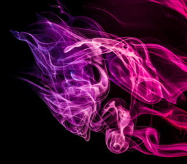 Colored smoke on black background
