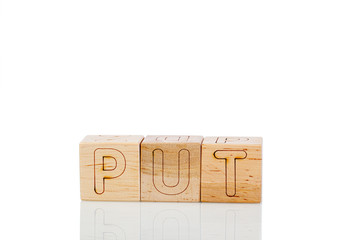 Wooden cubes with letters put on a white background