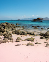 boat on the pink beach