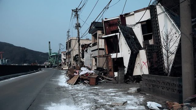 Destroyed houses with only ruins left in the street, after the tsunami on March 11th 2011 near Fukushima