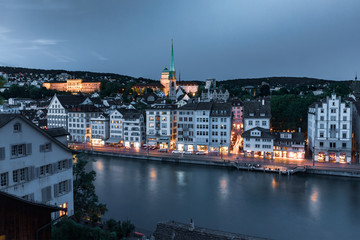 Aerial view of Old Town and river Limmat during morning blue hour in Old Town of Zurich, the largest city in Switzerland