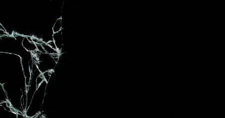Broken cracks glass fracture effect texture isolated abstract black background. Bullet cracked window with big hole screen mirror weapon shot.