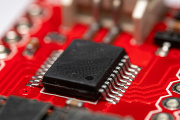 Macro photo of an Arduino development Modules circuit board with resistors microchips and other...