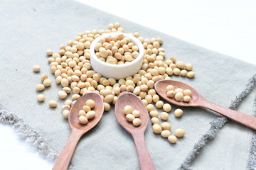 Fototapeta na wymiar Raw soybeans (Glycine max) displayed in containers