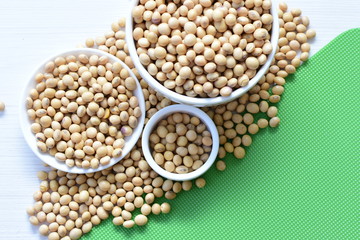 Raw soybeans (Glycine max) displayed in containers