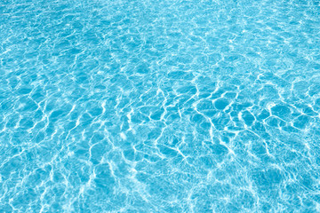 Fototapeta na wymiar Swimming pool water in a luxury resort. Tourism and travel, vacation.
