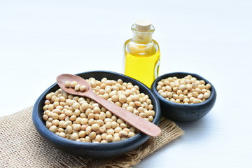 Raw soybeans (Glycine max) displayed in containers