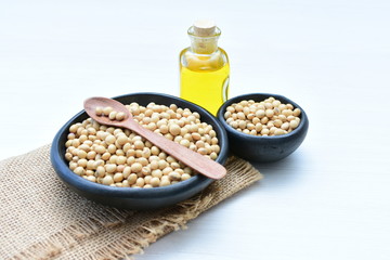 Raw soybeans (Glycine max) displayed in containers