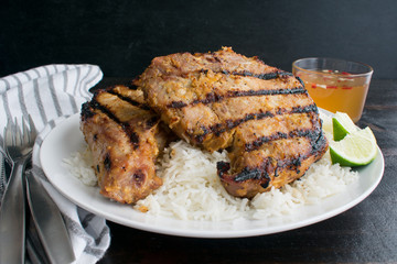 Vietnamese Grilled Lemongrass Pork Chops: Grilled pork chops that have been marinated in a lemongrass sauce