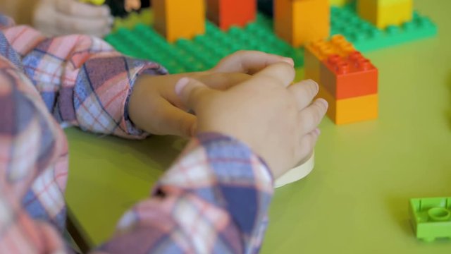 Kids creating robots with teacher. Early development, innovation, modern technology concept