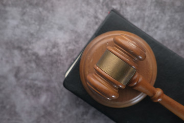 Close up of gavel on table against american flag 