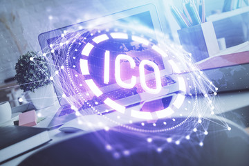 Multi exposure of blockchain and crypto economy theme hologram and table with computer background....