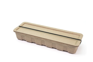 The close up of pen and pencil case box storage (recycle paper box) on white background.