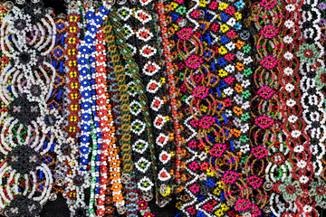 Tribal colorful beads bracelets for sale for tourists at the street market in Kota Kinabalu, island Borneo, Malaysia