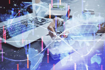 International business hologram over woman's hands taking notes background. Concept of success. Double exposure