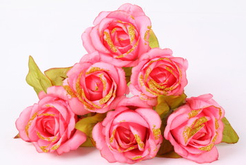Close up Pink textile rose on white background