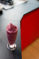 blueberry smoothie put on black table.