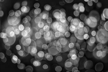 Abstract​ Light​ Back​ and​ White​ Bokeh​ Background​