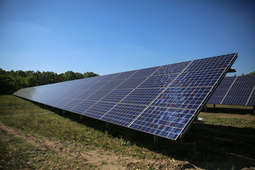 Line of solar power plant panels.