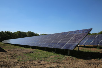 Line of solar power plant panels.