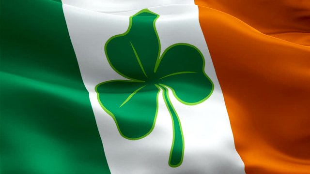 Irish flag Shamrock Closeup 1080p Full HD 1920X1080 footage video waving in wind with four leaf clover. Saint Patrick Dublin 3d Irish flag waving. St Pattys Ireland seamless loop animation. 4 leaf clo