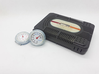 Electronic Portable Thermometer and Hygrometer Gauge Metering Measurement Device for Science Engineering Purpose in White Isolated Background