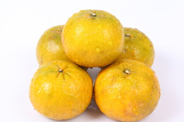 Fresh Oranges Harvest isolated on white background.