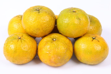 Fresh Oranges Harvest isolated on white background.