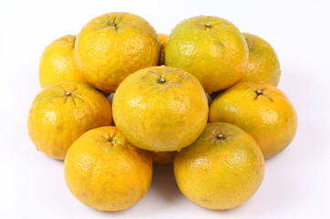 Fresh Oranges Harvest isolated on white background.