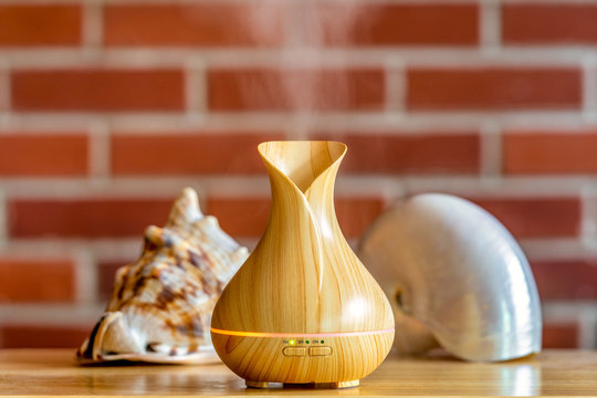 Essential Oil Diffuser In Warm Home Setting