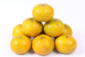 Fresh Oranges Harvest isolated on white background.