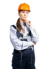 Female construction engineer with dollars in her pocket with a serious look. isolated