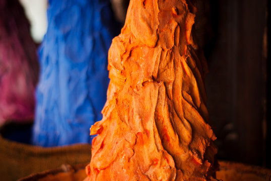 Colored pigments at a market in Chefchaouen, Atlas mountains, Morocco