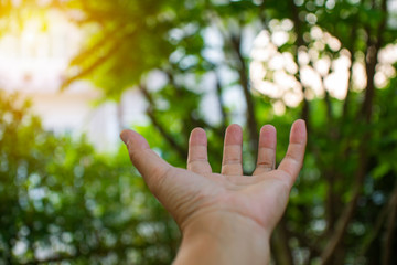 Technology, hand holding with environment Icons over the Network connection on green background.