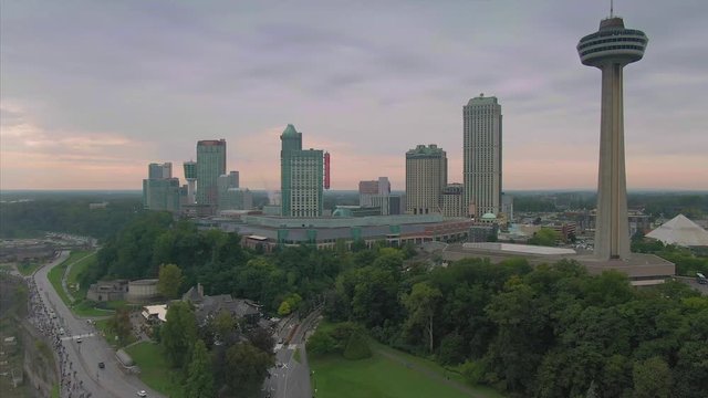 Aerial flying over The city of Niagara, Skylon Tower, hotels and casinos at the Niagara Falls. Ontario, Canada. 15 September 2019