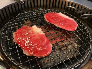 Sliced ​​beef on the grill. Wagyu beef.