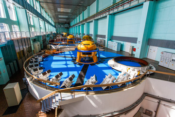 Industrial photography. Turbines in the main engine room of the Zeya hydroelectric station.