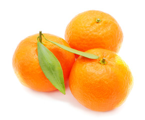 Three orange mandarins.