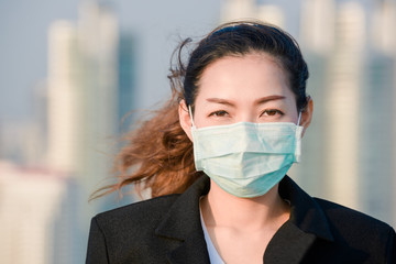 Business women wears a health mask