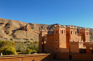 Renovated Kasbah overlooking farm fields in the Dades Gorge valley Morocco