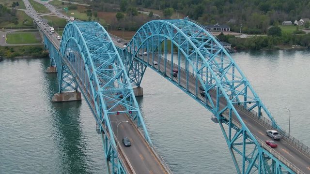 Aerial: Traffic crossing the South Grand Island Bridge over the Niagara River. Buffalo, New York, USA