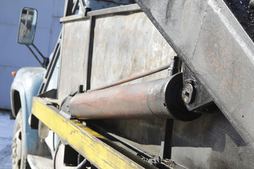 Cylinder of the crane boom lifting mechanism of the manipulator.