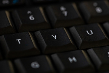 macro photo of keys on a computer keyboard