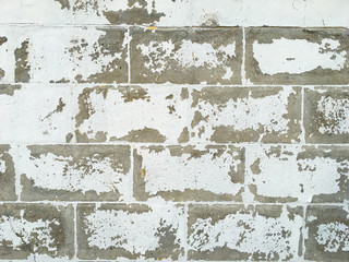 Peeled rough bricks concrete wall, Cement texture, White painted colour background, Interior and Exterior home concept