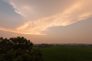 Composition of beautiful sky background, forest and sunset.